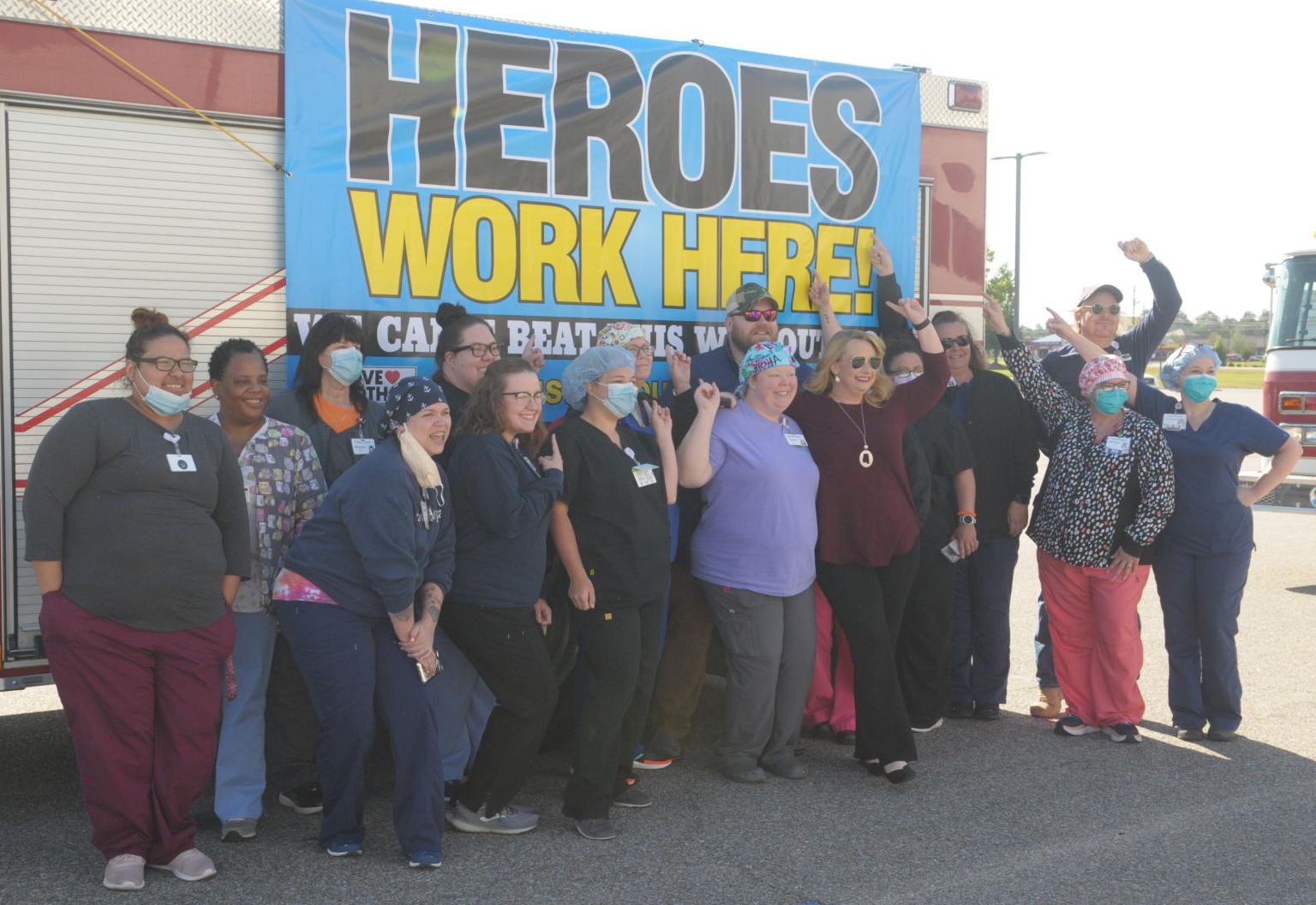 First responders give rolling salute to local health care workers